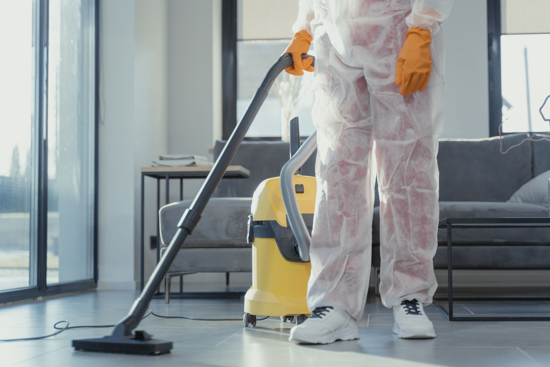 A professional mold remediation technician from Pro Peak Mold Removal discussing a report with a Lytle homeowner, demonstrating clear communication.